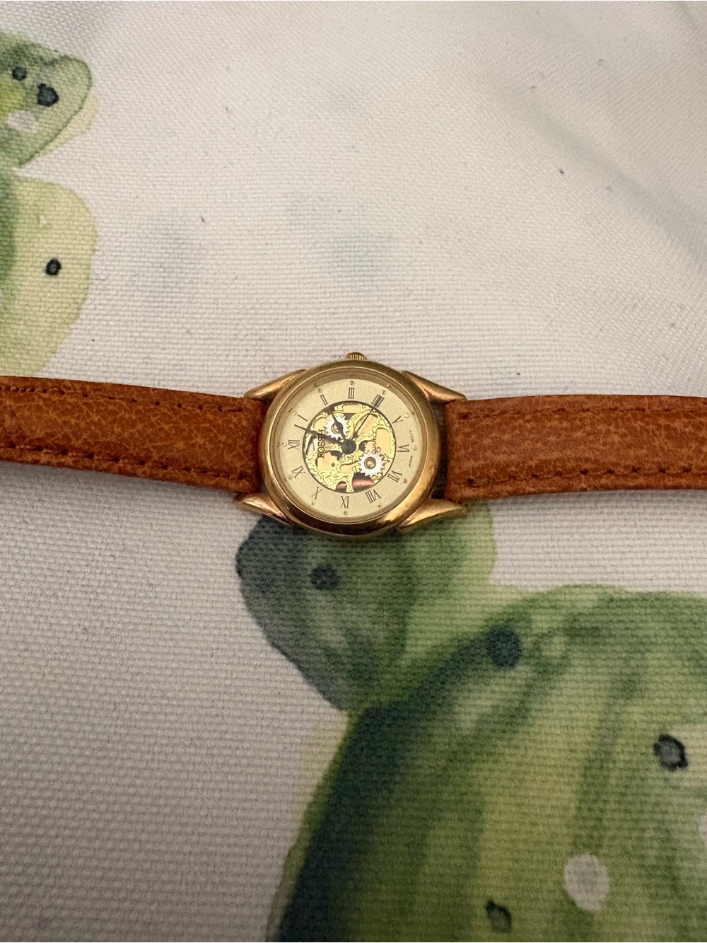 Gold-Tone Skeleton Dial Watch with Brown Leather Strap